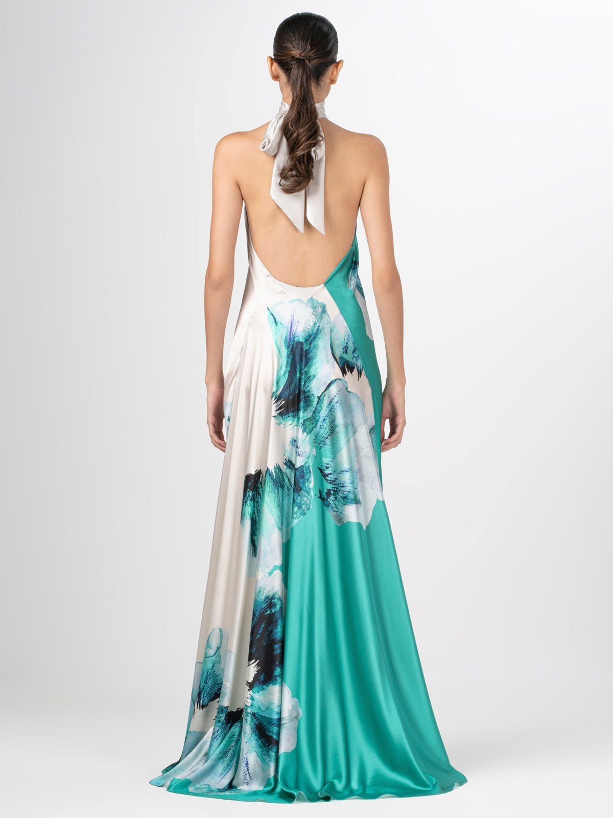 A Sherry Dress Aqua Abstract Wave with a floral print.