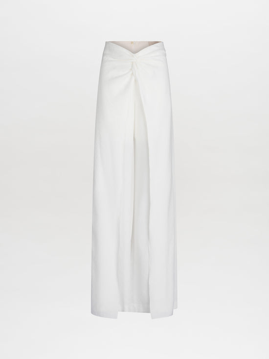 Canturipe Pant: A white maxi with a waist knot detail and a high front slit.