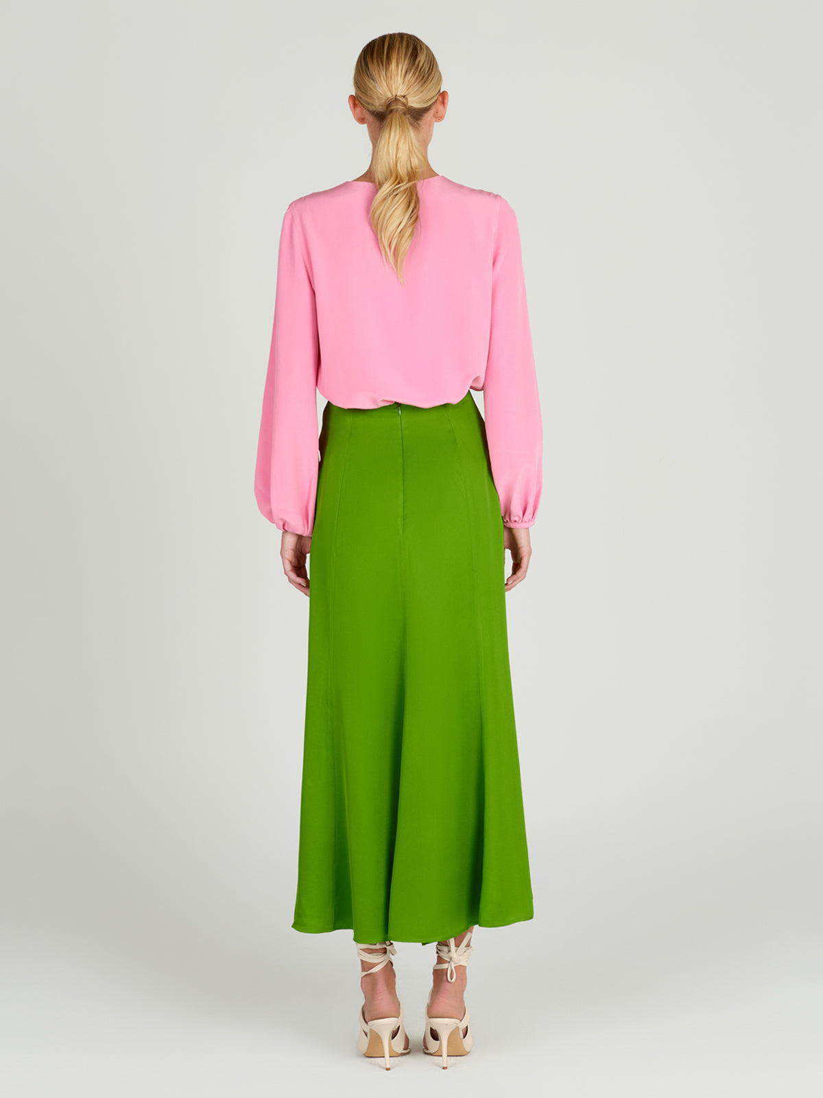 A glamorous Merve Blouse Pink with lace detailing.